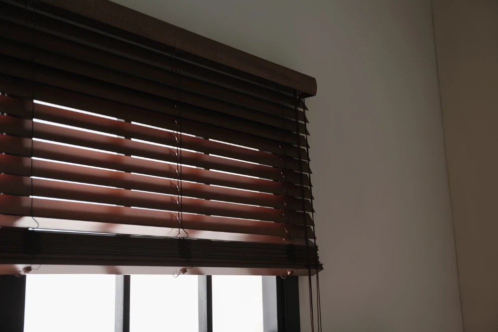 close up on dark faux wood blinds