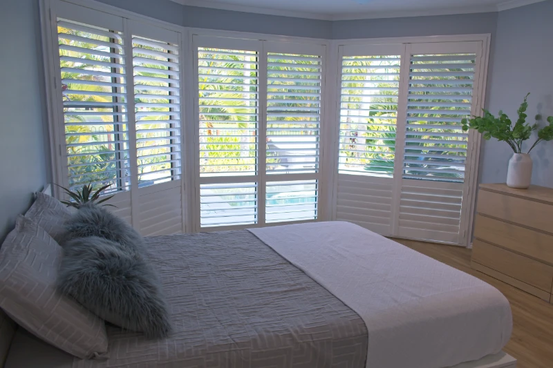 vinyl shutters on bedroom windows